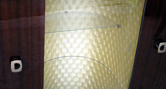 This fun Italian art deco bar cart is from the 1940’s and is veneered in rosewood polished to a high gloss.